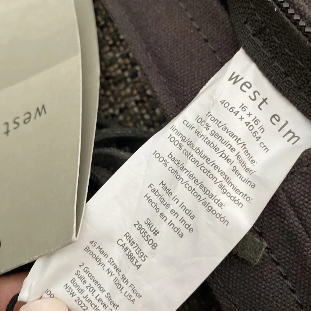 West Elm tasseled leather front pillow cases
